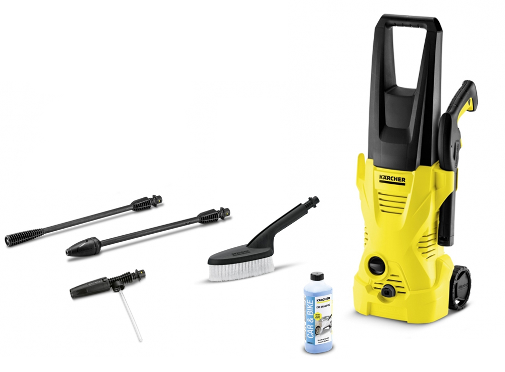 Myjka wysokociśnieniowa K 2 Car firmy Karcher prezentowana w pozycji stojącej wraz z wyposażeniem. Myjka wysokociśnieniowa K 2 Car firmy Karcher prezentowana w pozycji stojącej wraz z wyposażeniem.