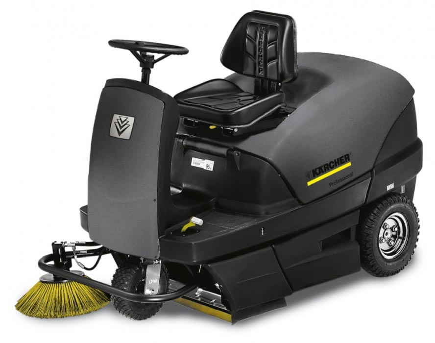 Profesjonalna, zamiatarka przemysłowa KM 100/100 R G firmy Karcher z silnikiem benzynowym. Profesjonalna, zamiatarka przemysłowa KM 100/100 R G firmy Karcher z silnikiem benzynowym. Prezentowana w pozycji stojącej.